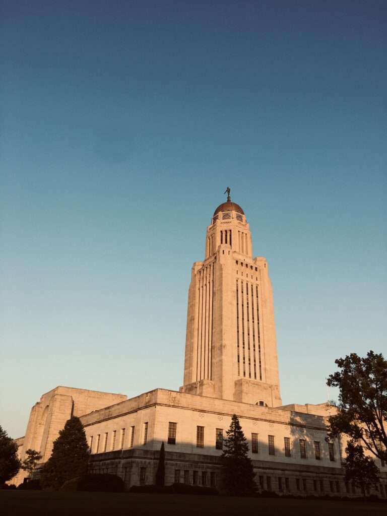 Nebraska State Capital building against a blue sky