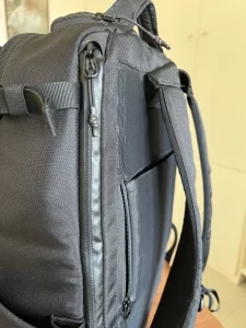 side view of black packpack with waterprooof zipper