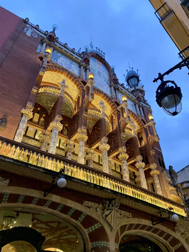 Image of a lit-up theatre facade at night